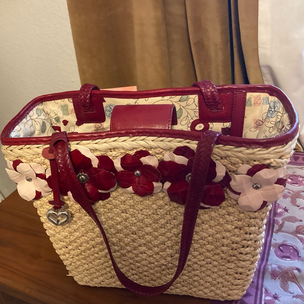 Brighton straw purse w red leather and flower details.